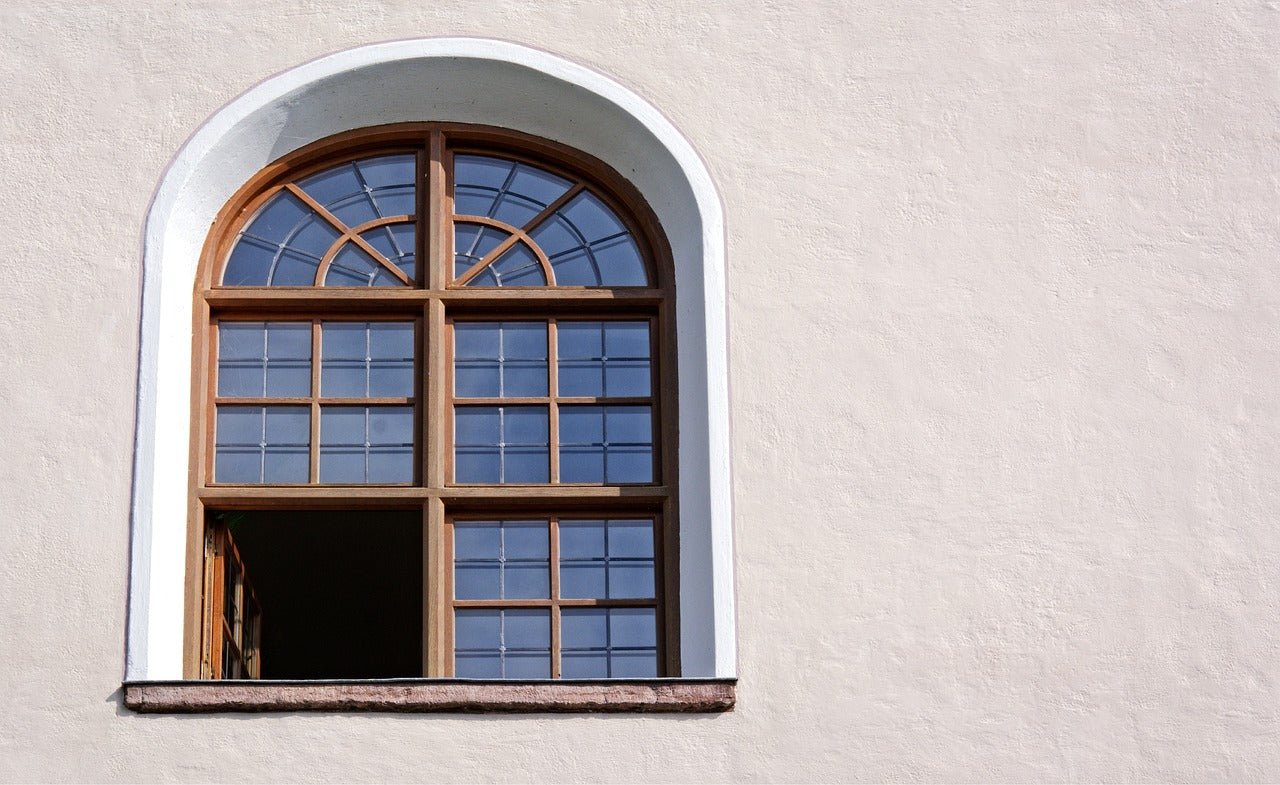 arched window viewed from the outside of a building