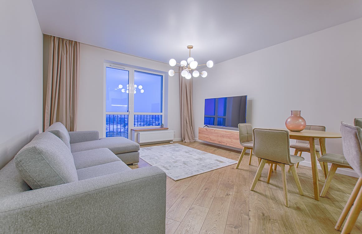 living room with floor to ceiling curtains