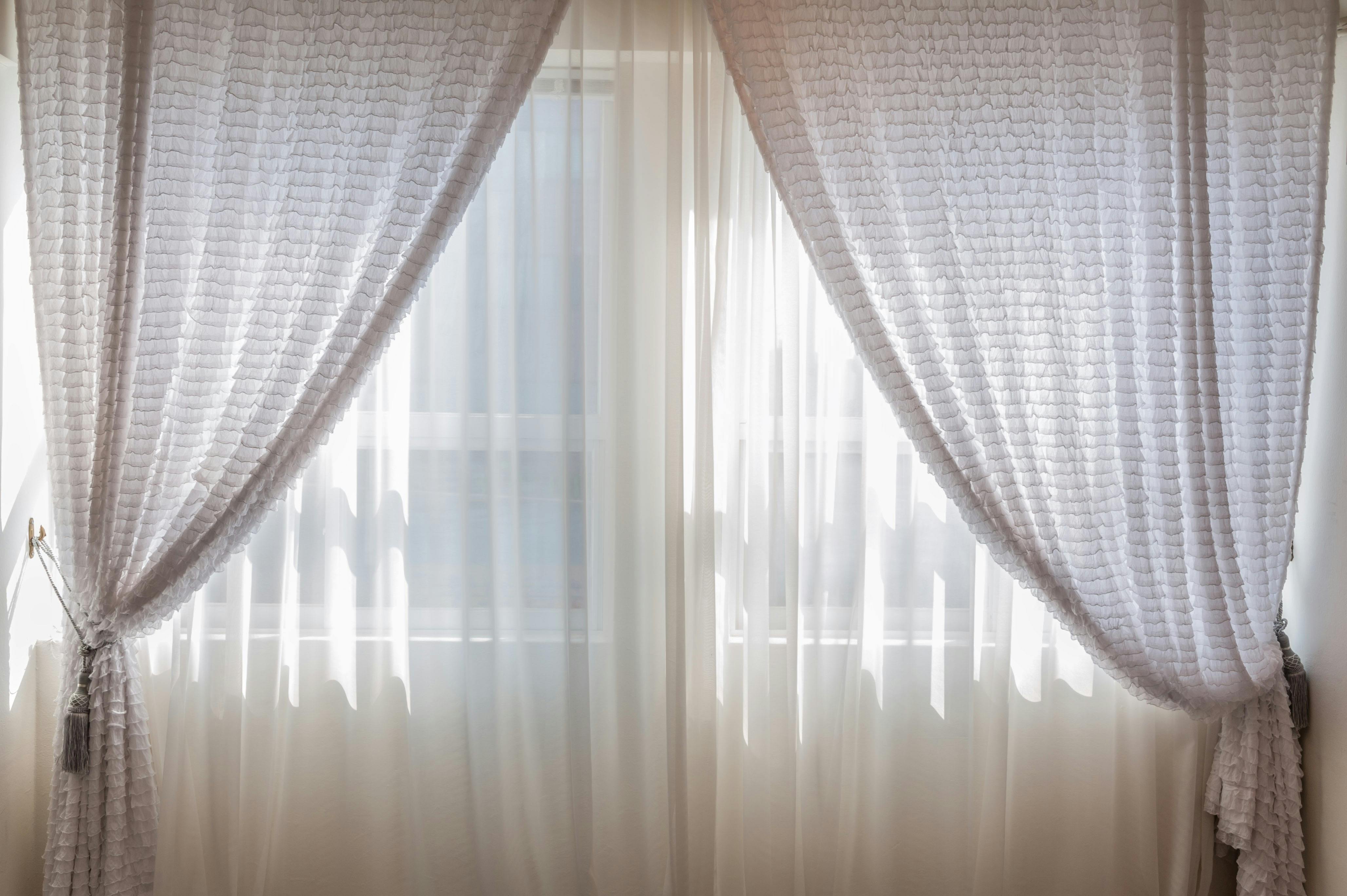 sheer curtains on double window